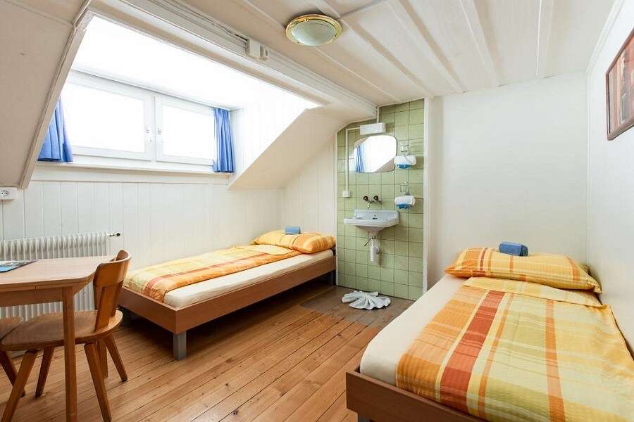 Onde Ficar em Interlaken: Dicas de Hotéis 21 Happy Inn Lodge
